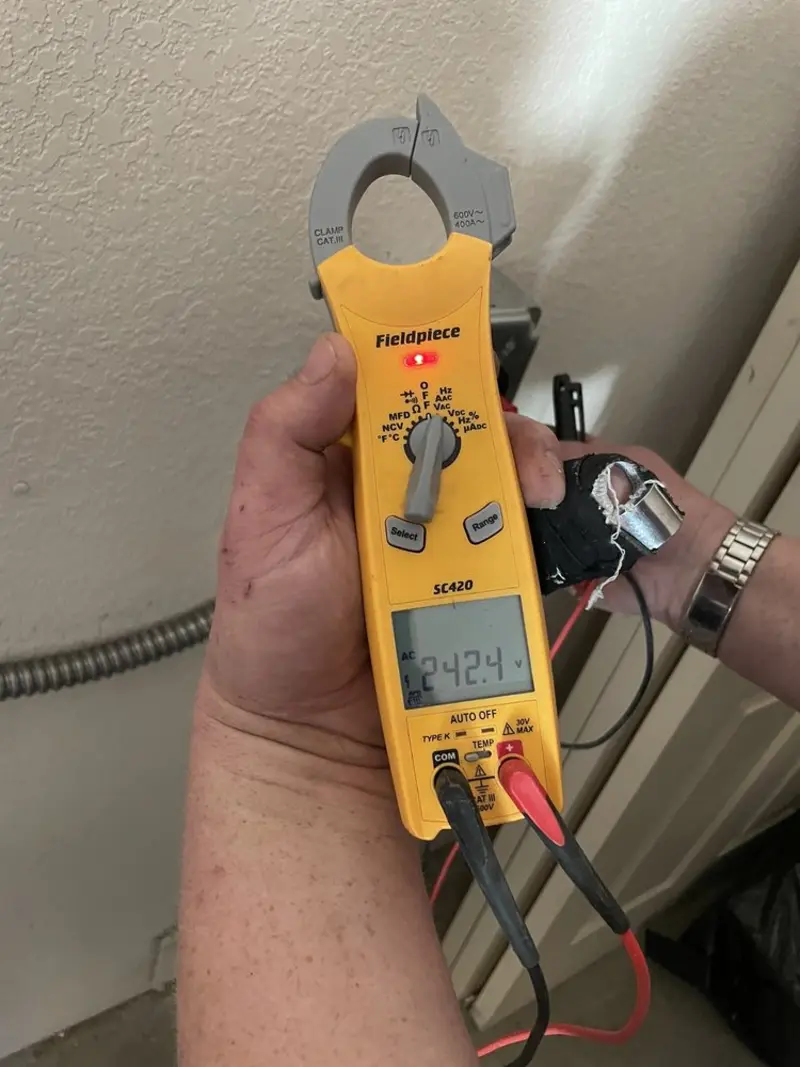 Voltage testing with clamp meter during Aluminum Wiring Replacement in Belchertown